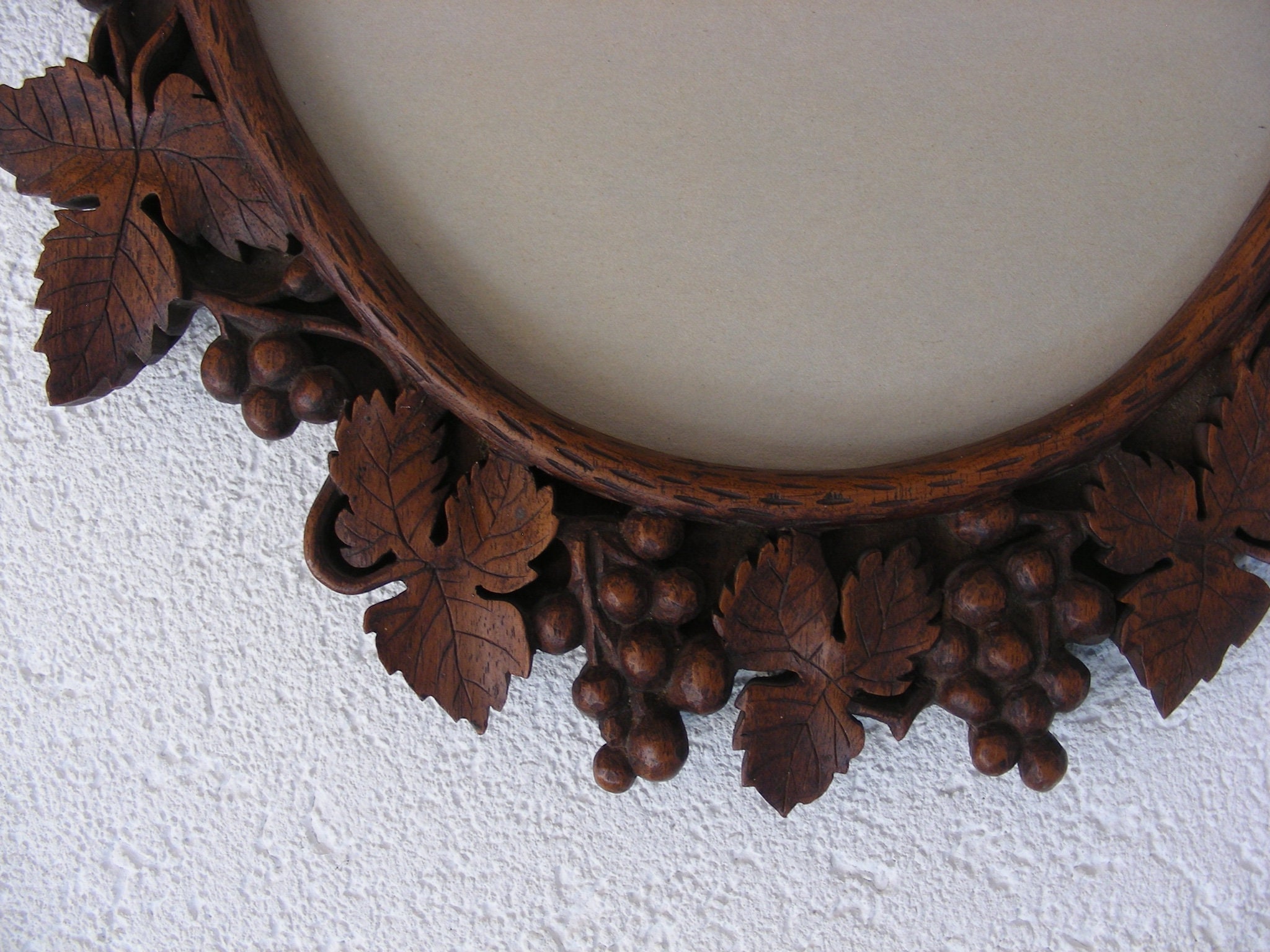 Beautifully carved, vintage, oak, oval mirror or picture frame, grapes and fruit, Brienz Switzerland