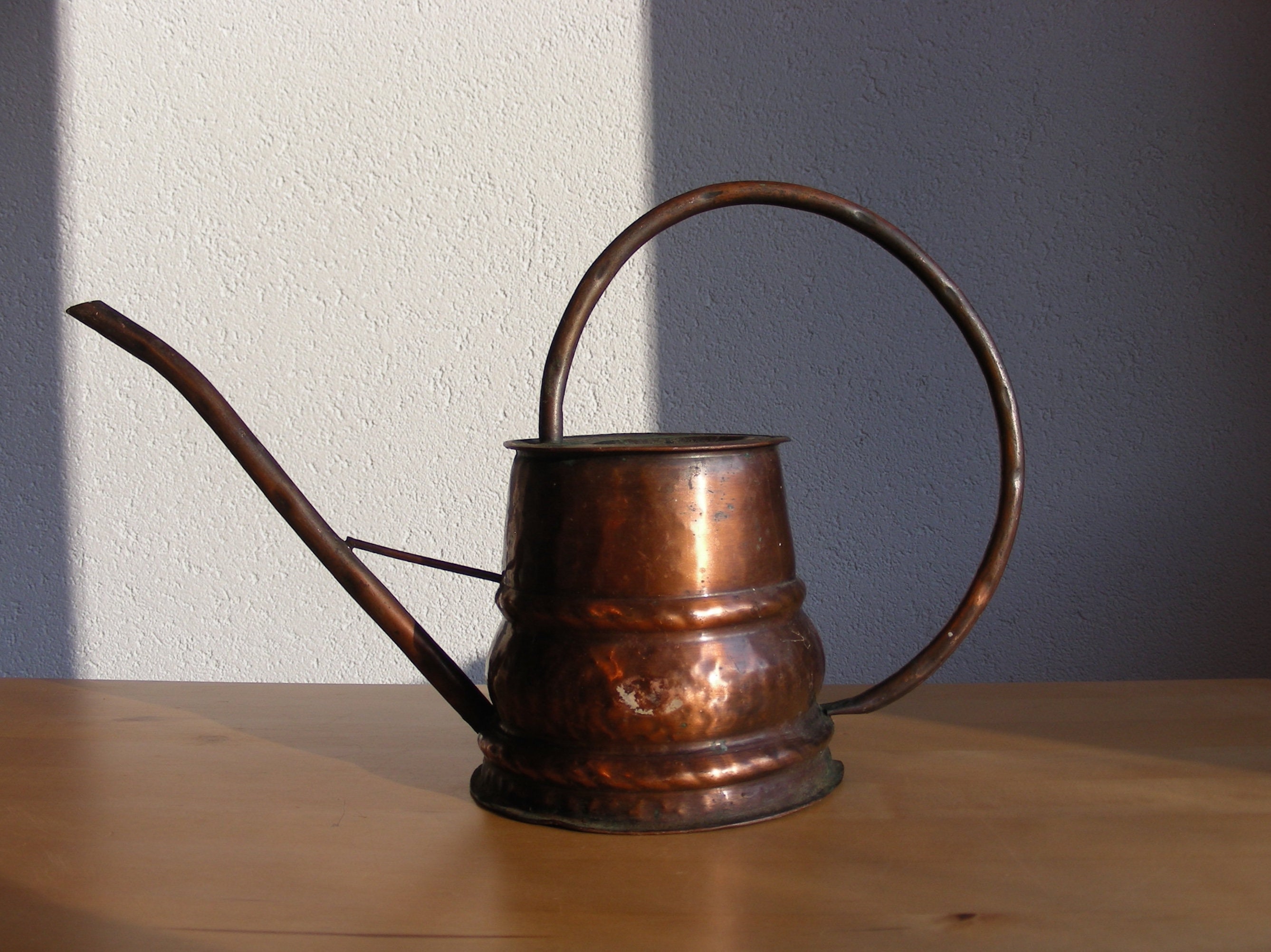 Vintage copper watering can with wonky handle, planter
