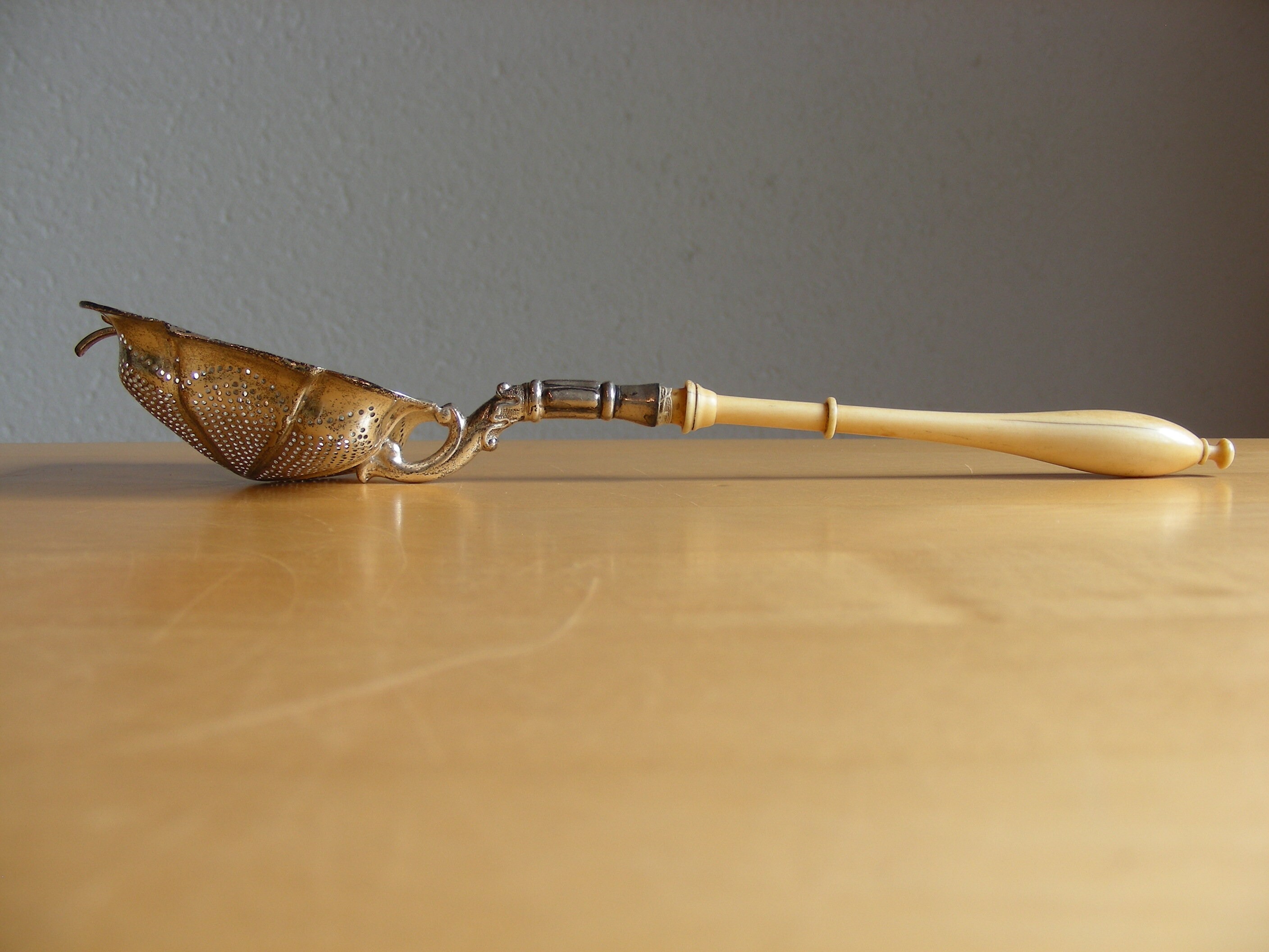 Antique tea strainer, 1880, 800 silver, bone handle