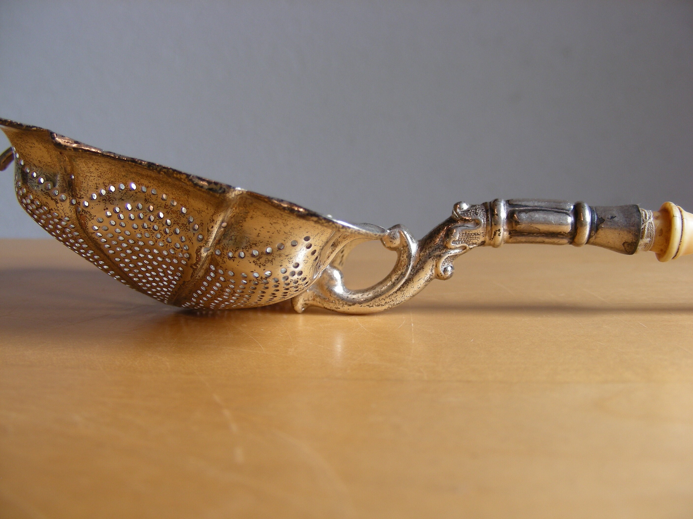 Antique tea strainer, 1880, 800 silver, bone handle