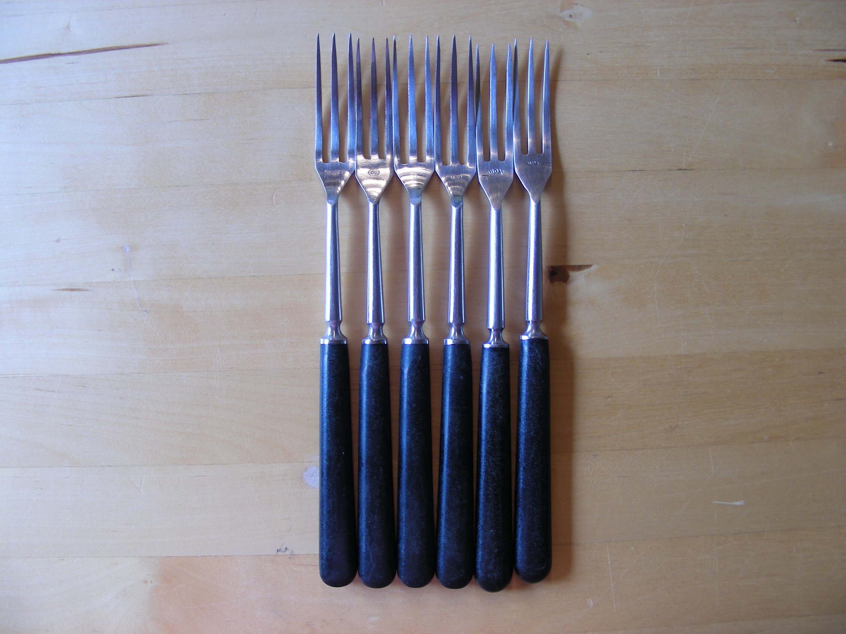 6 vintage Inox fondue forks with black handles