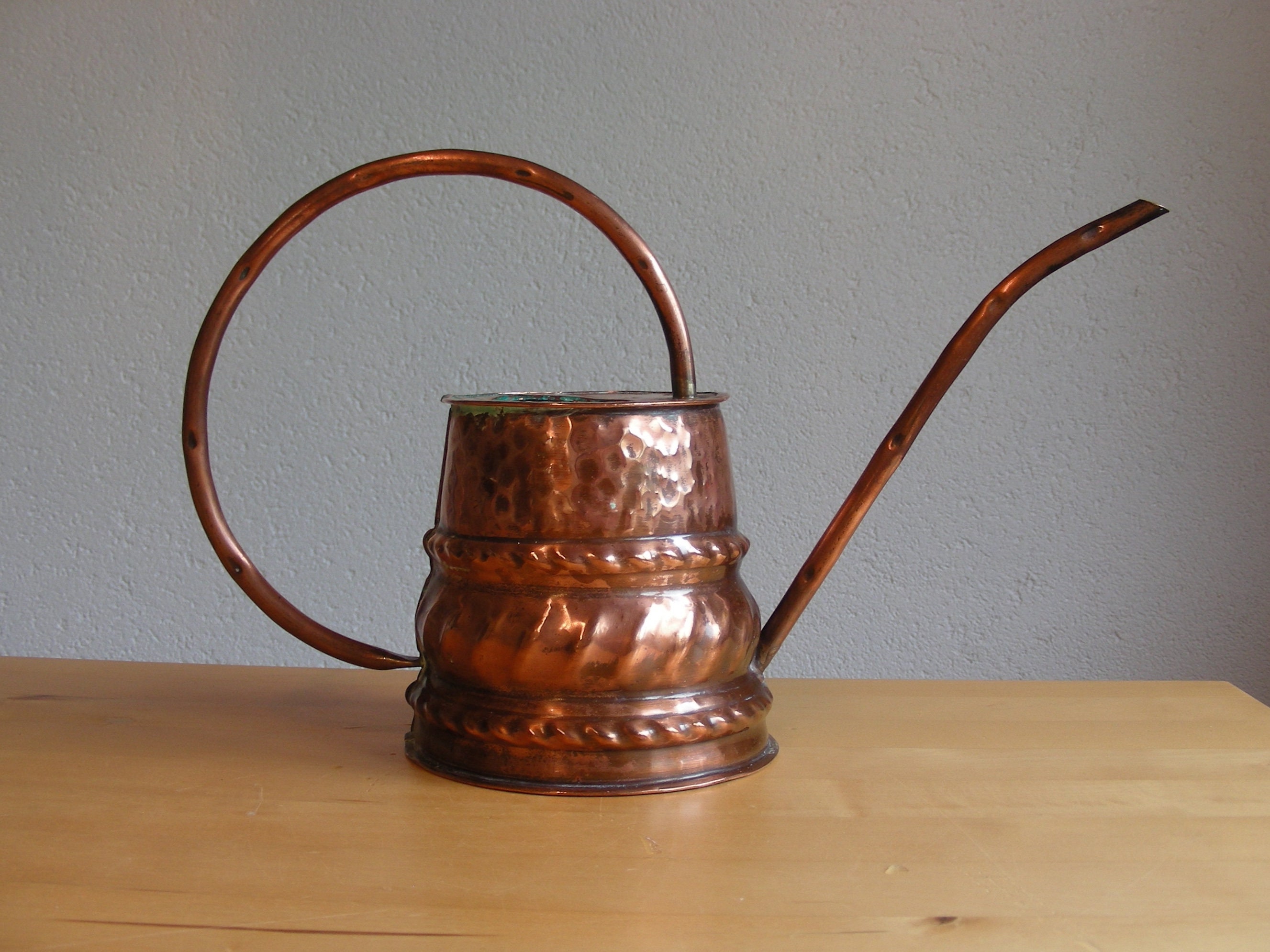 Shiny, vintage copper watering can