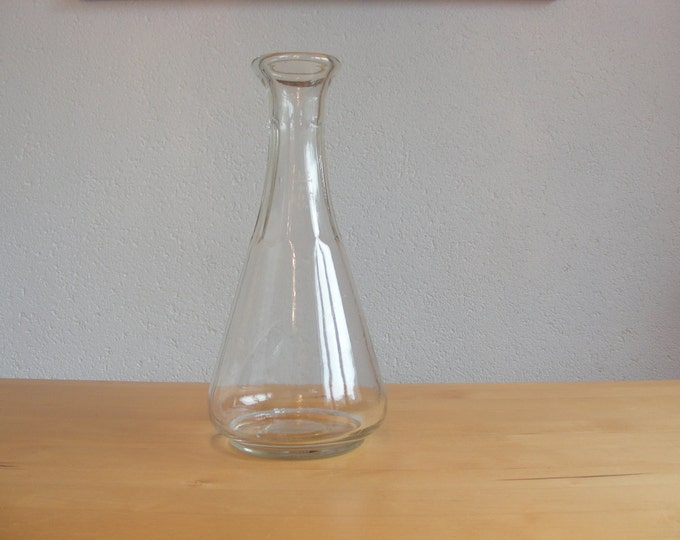 Two vintage carafes or decanters for wine or apple cider engraved with 1 liter mark and Swiss Cantonal symbol for restaurant use