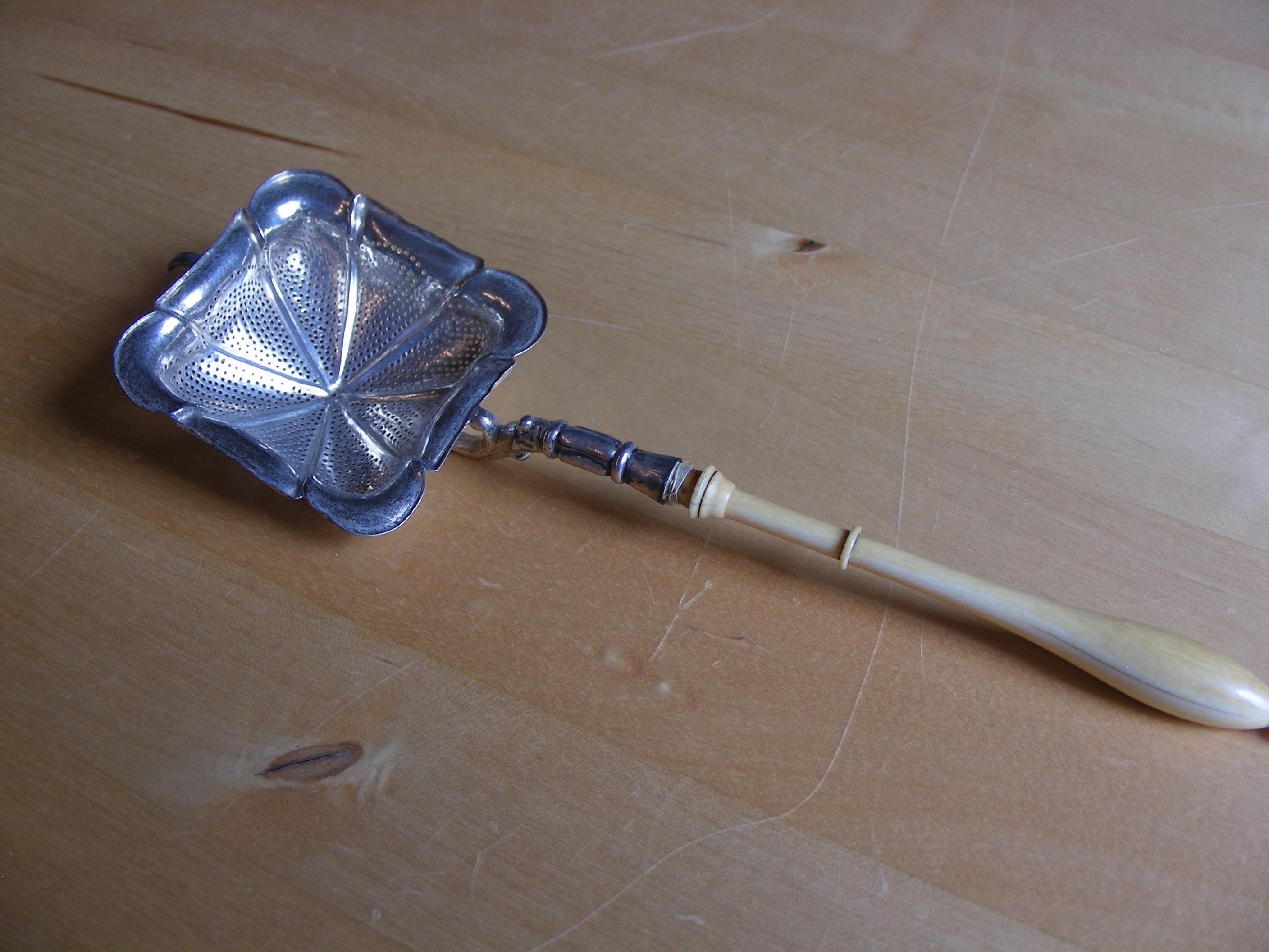 Antique tea strainer, 1880, 800 silver, bone handle