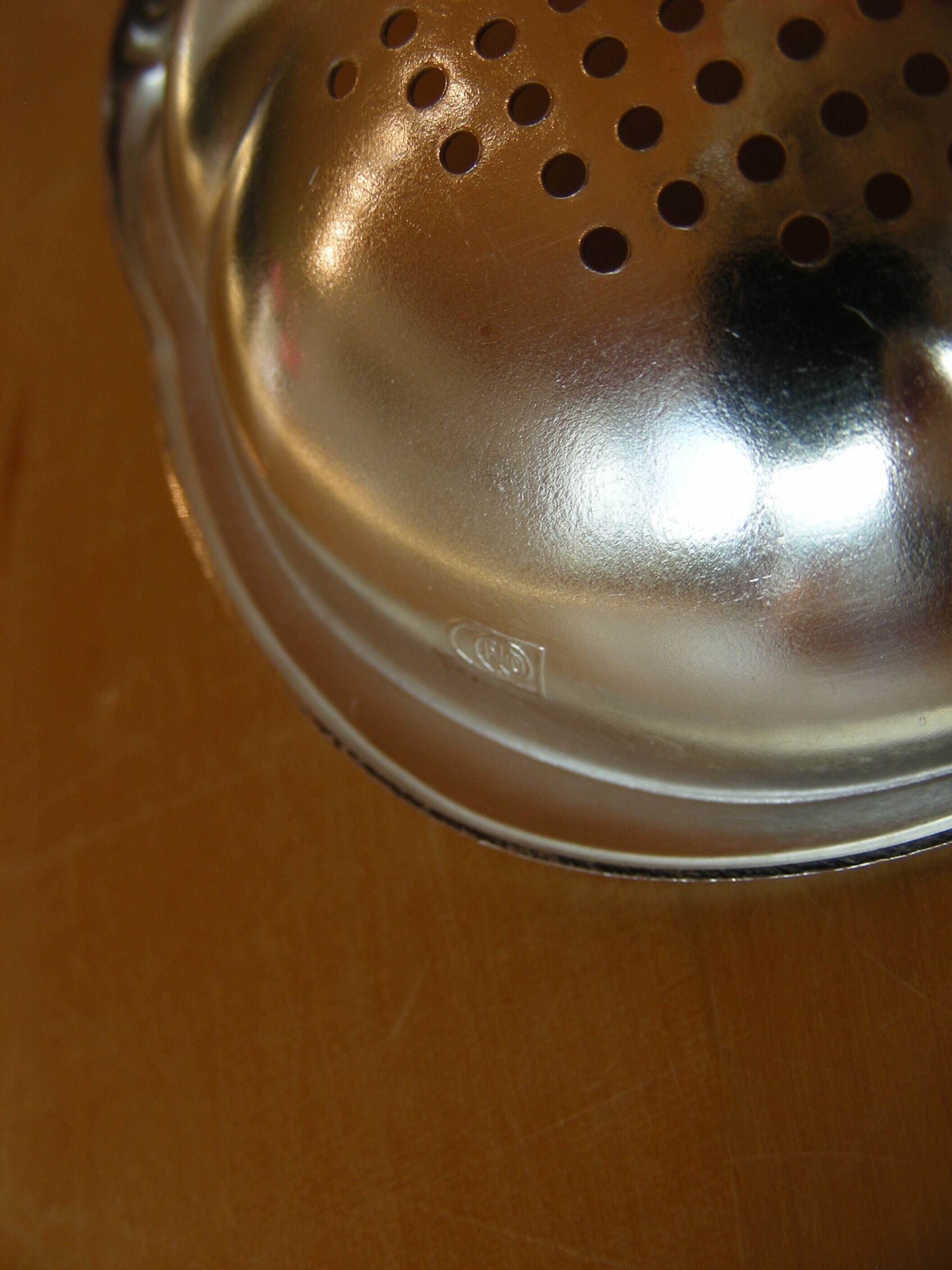 Quist Tea strainer and stand silver plated with Bakelite handle