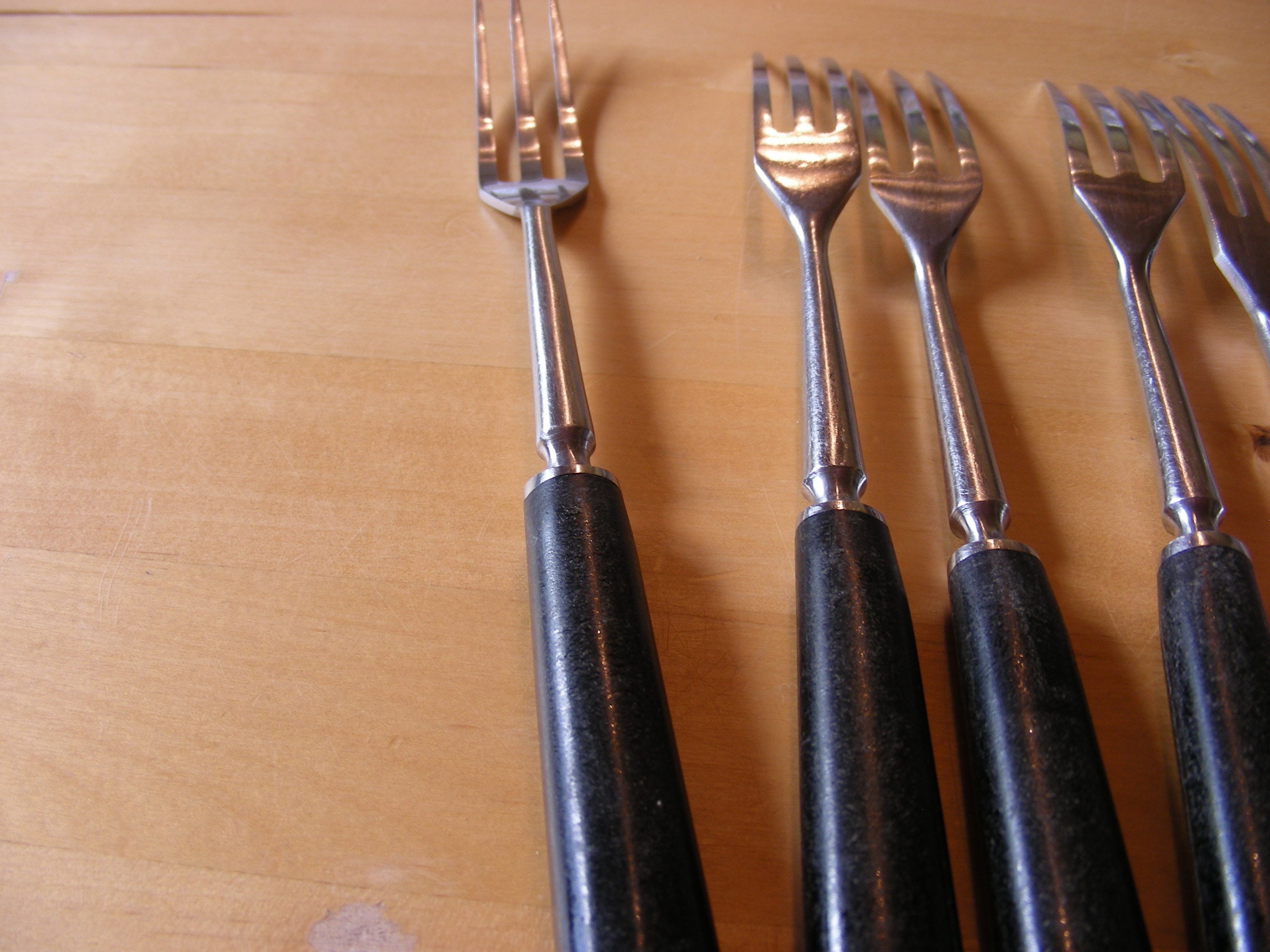6 vintage Inox fondue forks with black handles