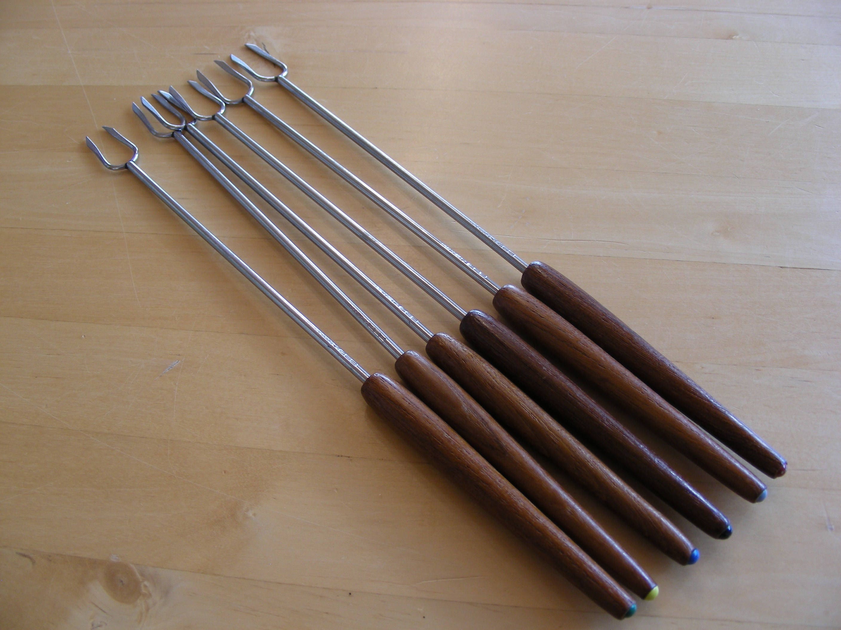 6 vintage mid century Swiss made fondue forks