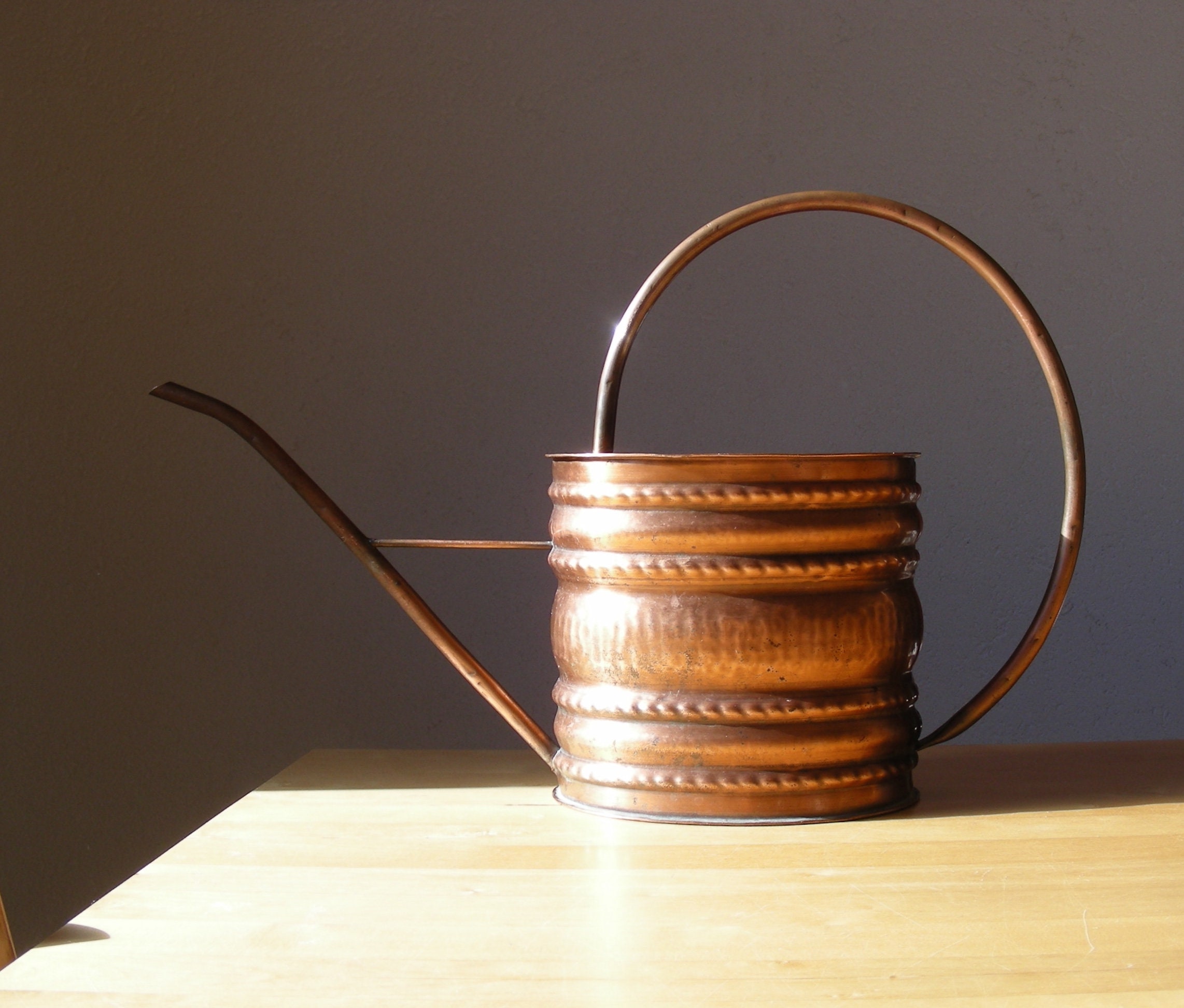 Big, beautiful vintage copper watering can