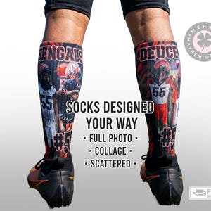 May include: A pair of black crew socks featuring a photographic collage of a football player wearing jersey number 55. The text on the socks reads BENGALS and DEUCE. The center text reads SOCKS DESIGNED YOUR WAY, FULL PHOTO, COLLAGE, SCATTERED.