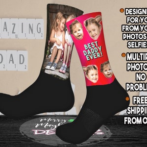 May include: Black socks with custom photo designs. One sock features a photo of two children, the other has multiple photos of a child with the text "BEST DADDY EVER!". The text "AMAZING DAD" is displayed with letter tiles.