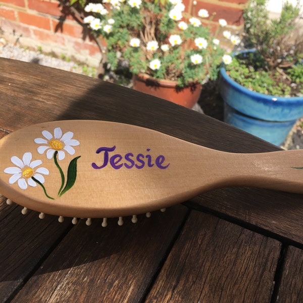 Personalised wooden hair brushes mainly for girls and women as they are a good size, environmentally friendly, hand painted and varnished