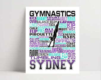 May include: A white rectangular poster featuring the word GYMNASTICS in large black letters at the top and the name SYDNEY in large purple letters at the bottom. A black silhouette of a gymnast on bars is centered among purple, teal, and black text.