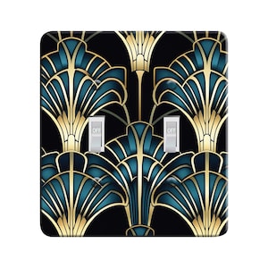 May include: A light switch cover with a decorative design featuring a repeating pattern of stylized blue and gold leaves on a black background. The cover has two toggle switches labeled "OFF".