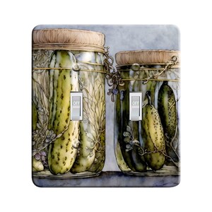 May include: Two glass jars filled with green pickles, with a brown lid and a wire closure. The jars are on a light gray background with the word "OFF" on two light gray toggle switches.