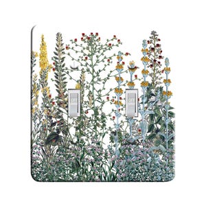 May include: A light switch cover with a botanical illustration of a variety of flowers and plants in shades of green, blue, yellow, and red. The switch cover has two toggle switches labeled "OFF".