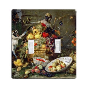 May include: A still life painting featuring two monkeys, one holding a bunch of grapes and the other holding a bowl of fruit. The painting is set against a dark background and features a variety of fruits, including grapes, apples, pears, and plums.
