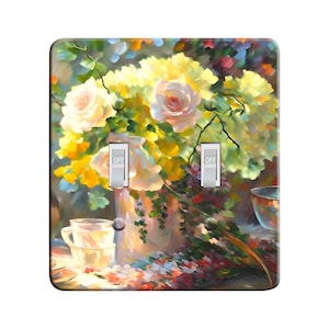 May include: A light switch plate with a painting of a bouquet of yellow and white roses in a vase on a table with two teacups. The painting is in a painterly style with soft brushstrokes. The switch plate has two toggle switches labeled "OFF".