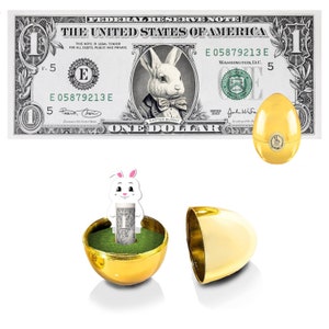 El billete oficial de un dólar del conejito de Pascua con huevo dorado V2. 1,0 dólares reales. Bancable y gastable. Relleno/relleno de cesta de Pascua.