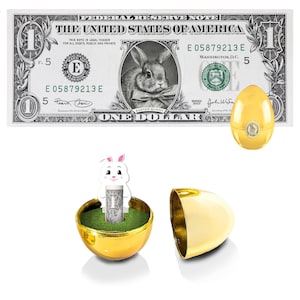 A nota de dólar oficial do coelhinho da Páscoa com Golden Egg V2. 1,0 dólar real. Bancável e gastável. Recheio / Enchimento de Cesta de Páscoa.