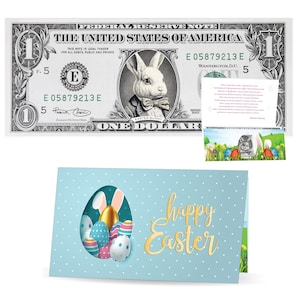 Le billet officiel d’un dollar de lapin de Pâques. Réal 1,0 USD 2. Chaque billet est accompagné d’une carte de Pâques et d’un porte-monnaie. Remplisseur / remplisseur de panier de Pâques