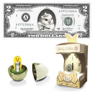 A nota de dólar oficial do pintinho da Páscoa com ovo de ouro. Real 2,0 USD com Caixa Premium. Bancável e gastável. Recheio / Enchimento de Cesta de Páscoa.