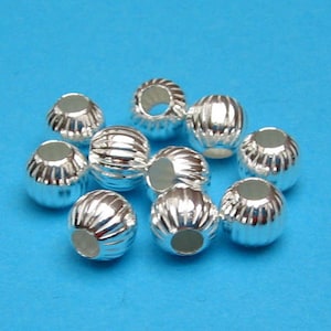 10 pieces ball Ø 5 mm grooved 925 silver