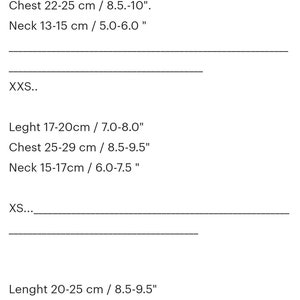 May include: Size chart for clothing with measurements in inches and centimeters.  XXXS: Length 5.5-6.5 inches (15-17 cm), Chest 8.5-10 inches (22-25 cm), Neck 5.0-6.0 inches (13-15 cm). XXS: Length 7.0-8.0 inches (17-20 cm), Chest 8.5-9.5 inches (25-29 cm), Neck 6.0-7.5 inches (15-17 cm). XS: Length 8.5-9.5 inches (20-25 cm), Chest 11.5-12.5 inches (29-32 cm), Neck 7.5-8.5 inches (18-21 cm).