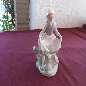 Lladro,  Lady with Rabbit - entitled Rabbit&#39;s Food (retired)