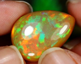 Opale welo 13.55 carats Goutte, multicolore pattern corail, base caramel, 100% Naturelle origine Ethiopie.