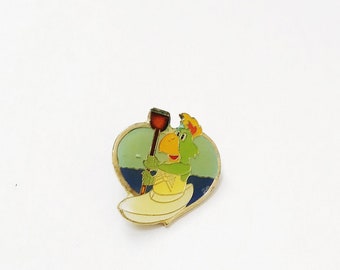 Pin de esmalte vintage de los Juegos Panamericanos de 1985: Mascota Amigo en canoa