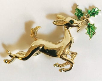 Vintage Reindeer Pin Christmas Lapel Pin Holiday Brooch Green Jewel Eye Reindeer with Holly Prancing Deer Costume Jewelry