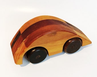Vintage Hand Carved Wood Race Car: Sleek Wooden Toy Automobile