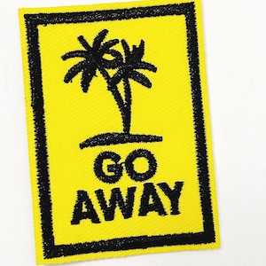 May include: A yellow patch with a black border, featuring the words "GO AWAY" in black. Above the text is a black illustration of two palm trees.
