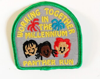 Flickscoutmärkelse: Millennium Panther Run, applikation för samarbete