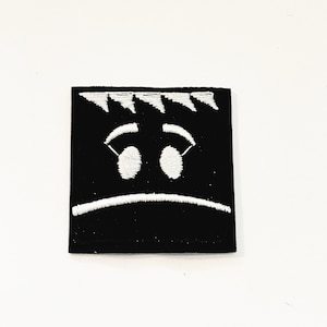 Sad Face Embroidered Patch: Black and White Iron On Applique