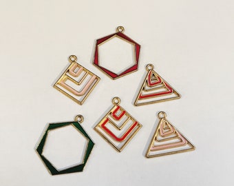 May include: Six gold-tone metal charms with geometric shapes. The charms are filled with red, green, and pink enamel. The shapes include a hexagon, a square, and a triangle.