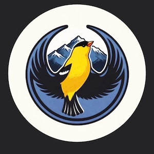 May include: A circular graphic featuring a yellow bird with black wings and a black head, set against a backdrop of blue mountains and wings. The design is enclosed within a blue circle, all set against a white background.
