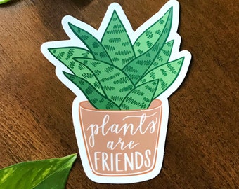Pegatina "Las plantas son amigas": Arte de planta con serpiente ilustrado a mano