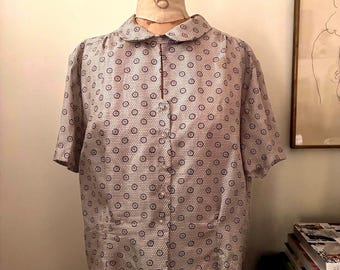 Vintage medallion print blouse with Peter Pan collar and “crystal” buttons.
