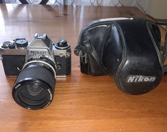 Nikon FE 35mm Camera #3038497 AND Nikkor 35-70 3.5 zoom lens Untested