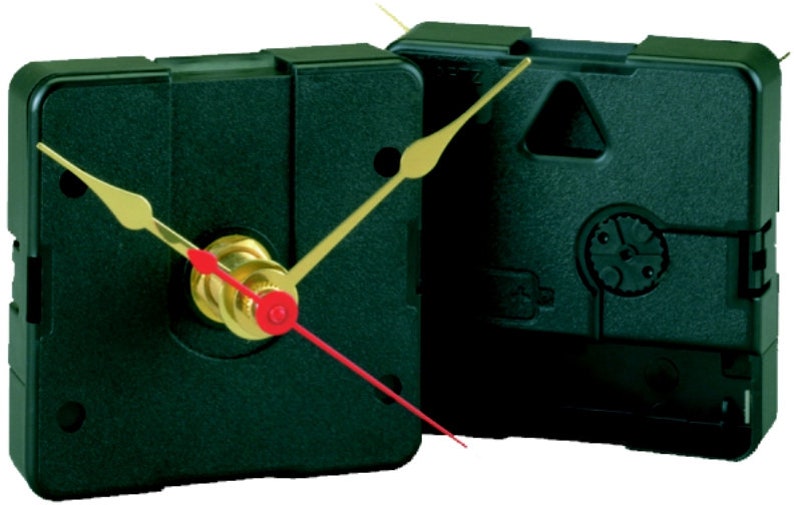 May include: A black clock mechanism with gold and red hands. The clock mechanism is square and has a black plastic casing.