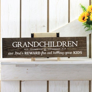 Grandchildren are Gods reward for not killing your own kids funny sign