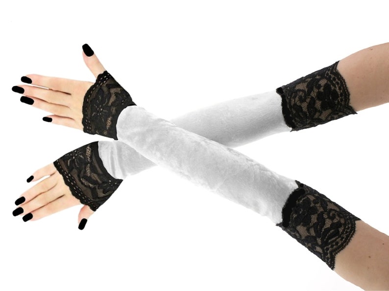 Elevate your evening ensemble with our opulent velvet fingerless gloves. Crafted with meticulous attention to detail, these extra long accessories exude elegance and grace. Featuring stylish front piping