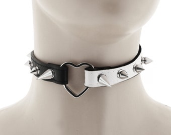 necklace choker collar made of vegan faux leather in white and black with heart ring and spiked adjustable buckle closure in rock punk