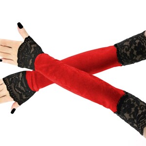 Immerse yourself in a world of luxury with our extraordinary collection of extra long velvet fingerless gloves. Designed for the discerning fashion connoisseur, these exquisite accessories boast stylish front piping and extend elegantly up the arm.