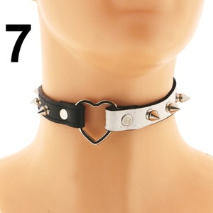 Explore our selection of chic chokers crafted from vegan faux leather. Choose from white or black with a heart ring detail and spiked punk rock design.
