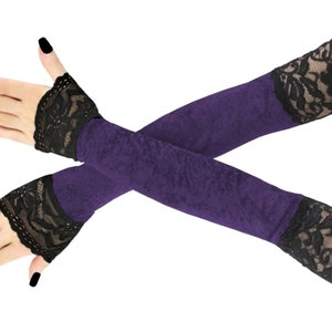Discover the epitome of elegance with our exquisite collection of extra long velvet fingerless gloves. Perfect for evening affairs, these luxurious accessories extend gracefully up the arm, adorned with stylish front piping.