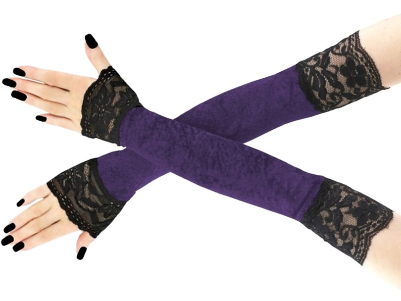 Discover the epitome of elegance with our exquisite collection of extra long velvet fingerless gloves. Perfect for evening affairs, these luxurious accessories extend gracefully up the arm, adorned with stylish front piping.