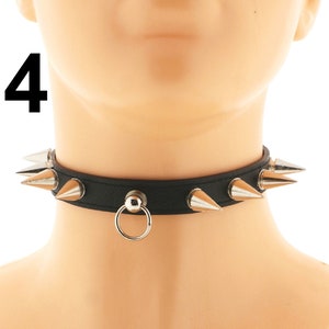 Make a statement with our Black Vegan Leather Spiked Punk Choker. This collar necklace for women combines a faux leather vegan collar, adjustable buckle closure, and a ring for a punk-inspired accessory.