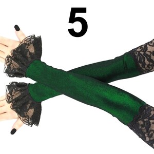 Make a bold fashion statement with these stunning opera-inspired arm warmers. Crafted in a mesmerizing lurex green and black color scheme, these extra-long fingerless gloves are the epitome of elegance. Not only will they keep your arms warm